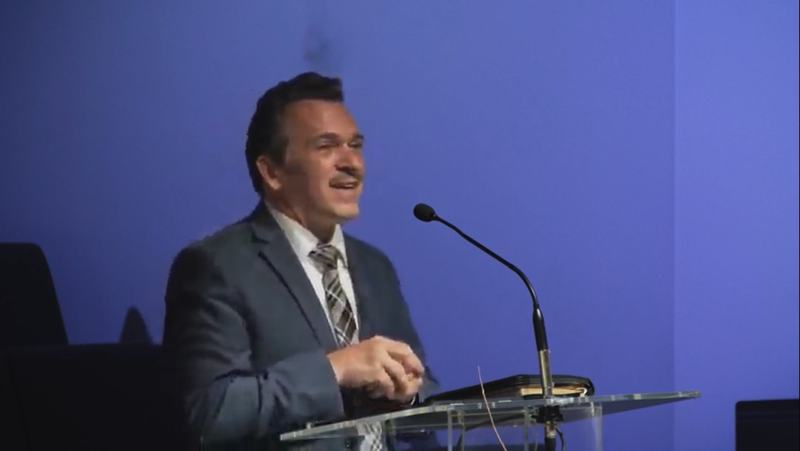 Pastor Abel preaching