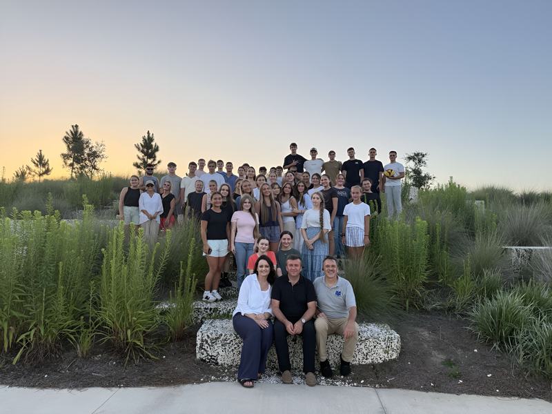 Youth gathering at sunset